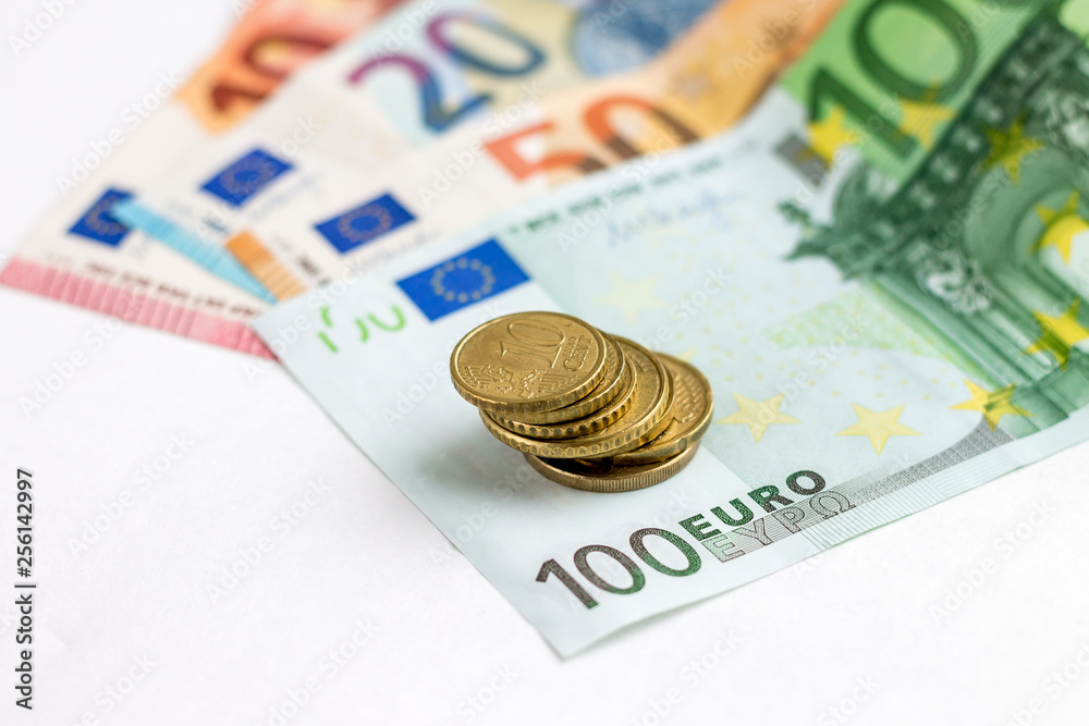 Euro money banknotes and travel passport on copy space background. Low salary. Communal payments Euro money banknotes and travel passport on copy space background. Low salary. Communal payments