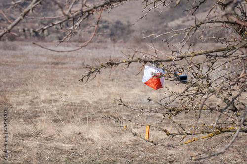 Orienteering. Check point Prism and composter for orienteering. Navigation equipment. The concept.