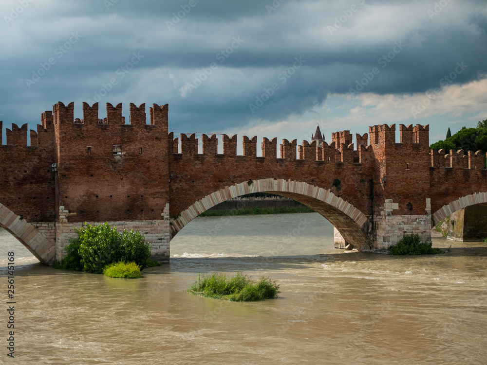view of the Adige river from the castelvecchio bridge in Verona, destination for tourists in love