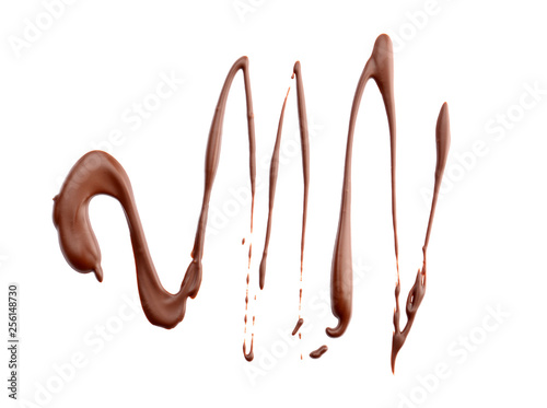 Spilled melted chocolate on white background