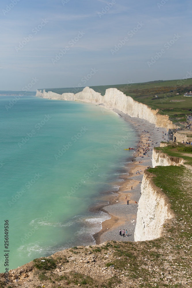 Beautiful British coastline Birling gap beach and Seven Sisters white chalk cliffs East Sussex England UK