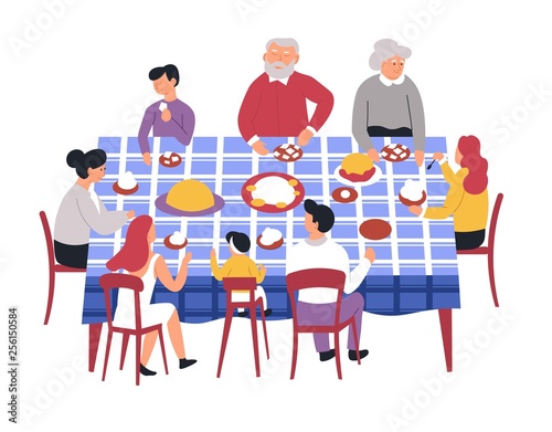 Family at table festive dinner parents and children grandparents