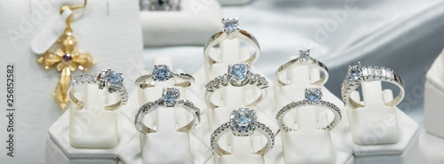 Jewelry diamond rings show in luxury retail store window display showcase