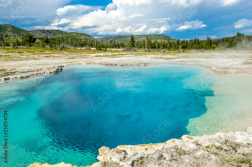 Deep beautiful Sapphire Pool of Biscuit Basin, Yellowstone national park, Wyoming, USA