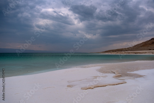 Beautiful green white salty coastline of Dead sea in Jordan