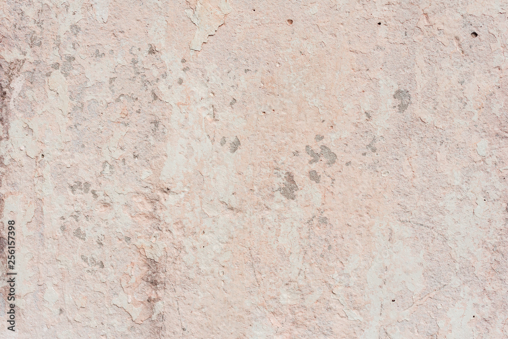 Wall fragment with scratches and cracks