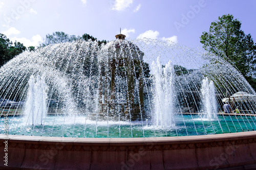 big beautiful fountain on a bright sunny day photo