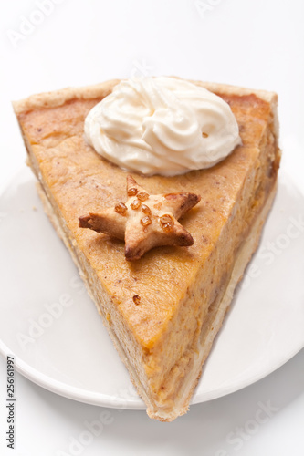 slice of Pumpkin pie with whipped cream