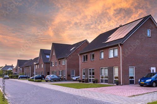 Street with modern family houses photo