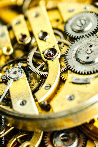 Vintage watch machinery macro detail monochrome.Mechanism of pocket watch with grunge texture.