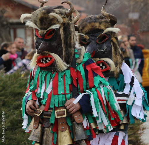 Zemen, Bulgaria - March 16, 2019: Masquerade festival Surva in Zemen, Bulgaria. People with mask called Kukeri dance and perform to scare the evil spirits.
