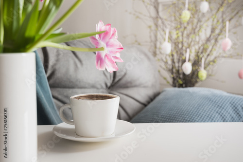 Morning coffee in spring interior. Easter Party Planning photo