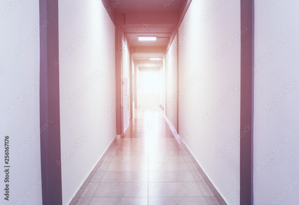 Stylish fashionable and modern corridor in the business center at the end of the sunset from the sun, copy space