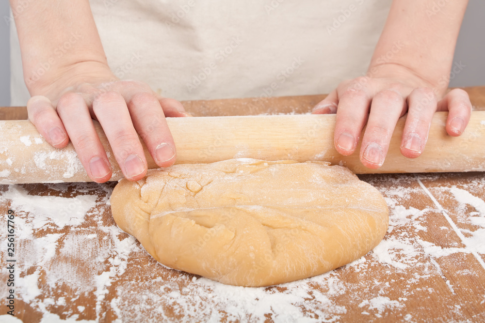rolling the dough for homemade egg pasta rolling the dough for homemade egg pasta