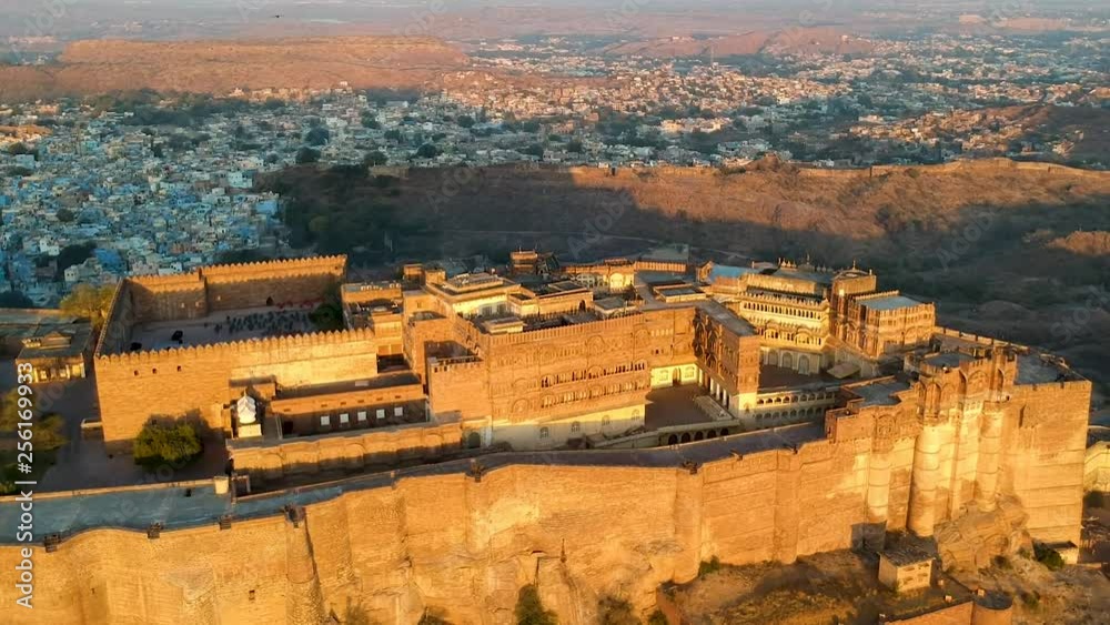 Golden hour aerial view of Mehrangarh Fort at sunrise. Jodhpur, Rajasthan, India Golden hour aerial view of Mehrangarh Fort at sunrise. Jodhpur, Rajasthan, India