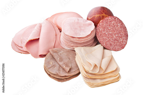 big group of thinly sliced meat on white background