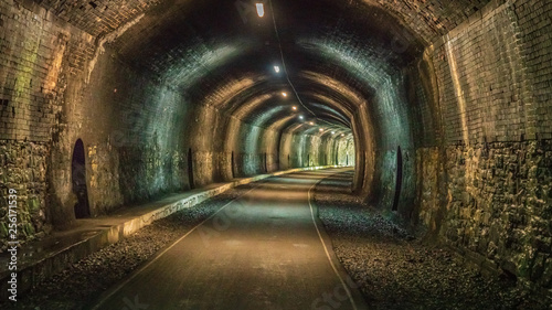 Walking through the Headstone Tunnel  near Monsal Head in the East Midlands  Derbyshire  Peak District  England  UK