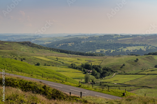 Peak District landscape, walking towards Stanage Edge near Hathersage in the East Midlands, Derbyshire, England, UK