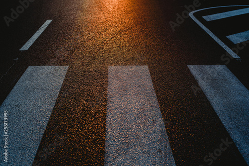 Photography Lonely street with pedestrian crossing at sunset, texture with space for text