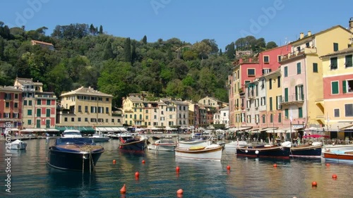 Portofino Genoa italian riviera cruise boat arriving in Portofino wealthy village and marina