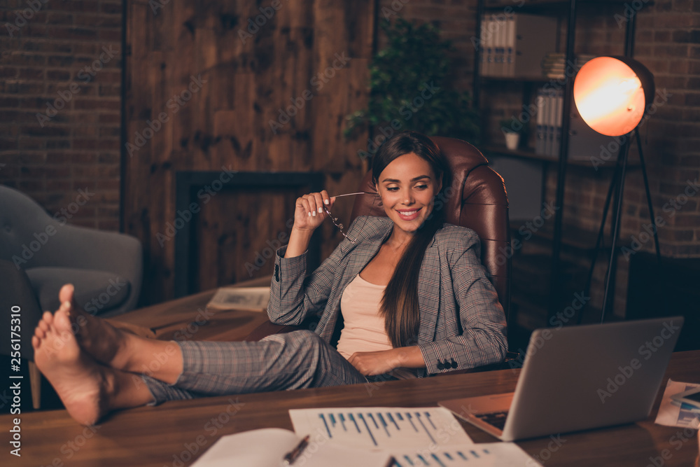Close up side profile photo beautiful she her business lady chief hard week weekend speak skype legs table look satisfied notebook overjoyed sit office chair wear specs formal wear checkered suit foto