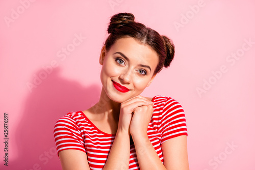 Close up photo beautiful she her lady pretty two buns bright pomade lipstick touch hold one cheek cheekbone lying arms hands together wear casual striped red white t-shirt isolated pink background
