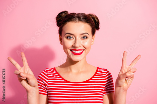 Close-up portrait of her she nice-looking cute charming attractive lovely cheerful cheery optimistic teen girl showing double v-sign isolated over pink pastel background