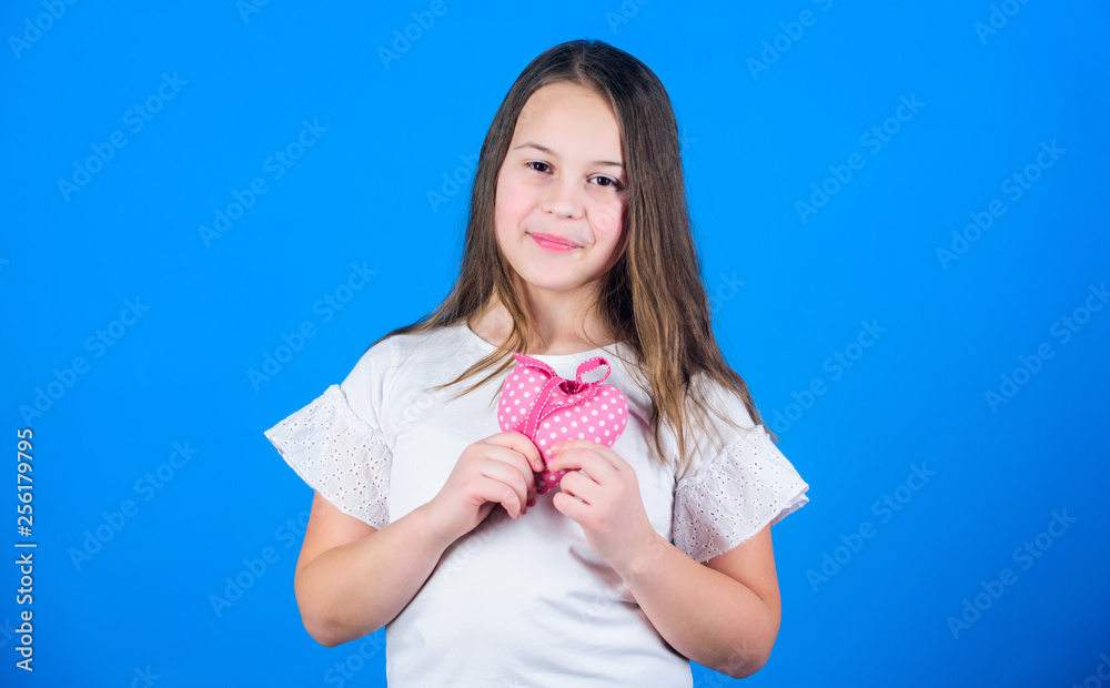 Happy valentines day. Small girl holding stuffed handmade heart for Valentines day. Little child with heart shaped decoration for valentines celebration. Valentines day gift Happy valentines day. Small girl holding stuffed handmade heart for Valentines day. Little child with heart shaped decoration for valentines celebration. Valentines day gift