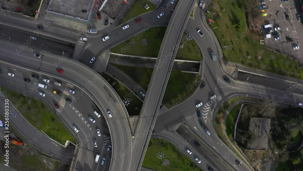 Aerial survey. The road from a bird's eye view. Top down view. The camera moves counterclockwise down. The intersection of five roads. City traffic in Sochi. Aerial survey. The road from a bird's eye view. Top down view. The camera moves counterclockwise down. The intersection of five roads. City traffic in Sochi.