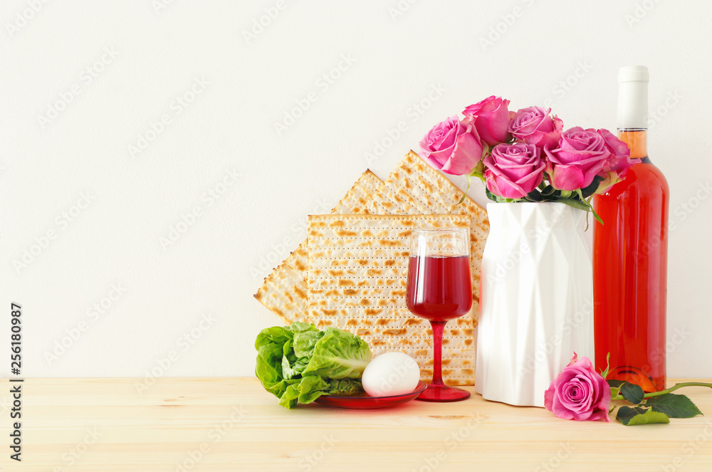 Pesah celebration concept (jewish Passover holiday) over wooden table Pesah celebration concept (jewish Passover holiday) over wooden table