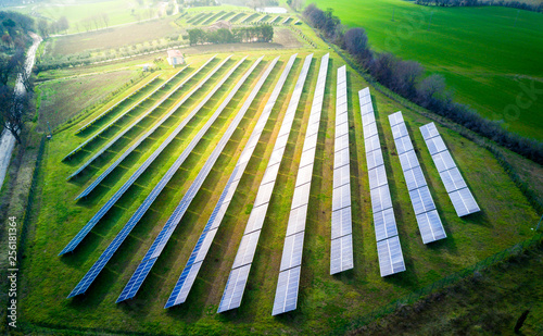 aerial view of solar panels on a sunny day. power farm producing clean energy photo