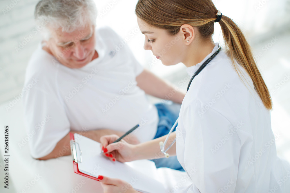 Elderly man at the doctor Elderly man at the doctor