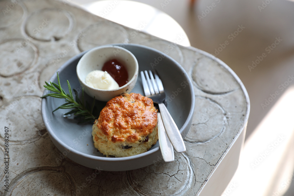 Scones with cream and strawberry jam Scones with cream and strawberry jam