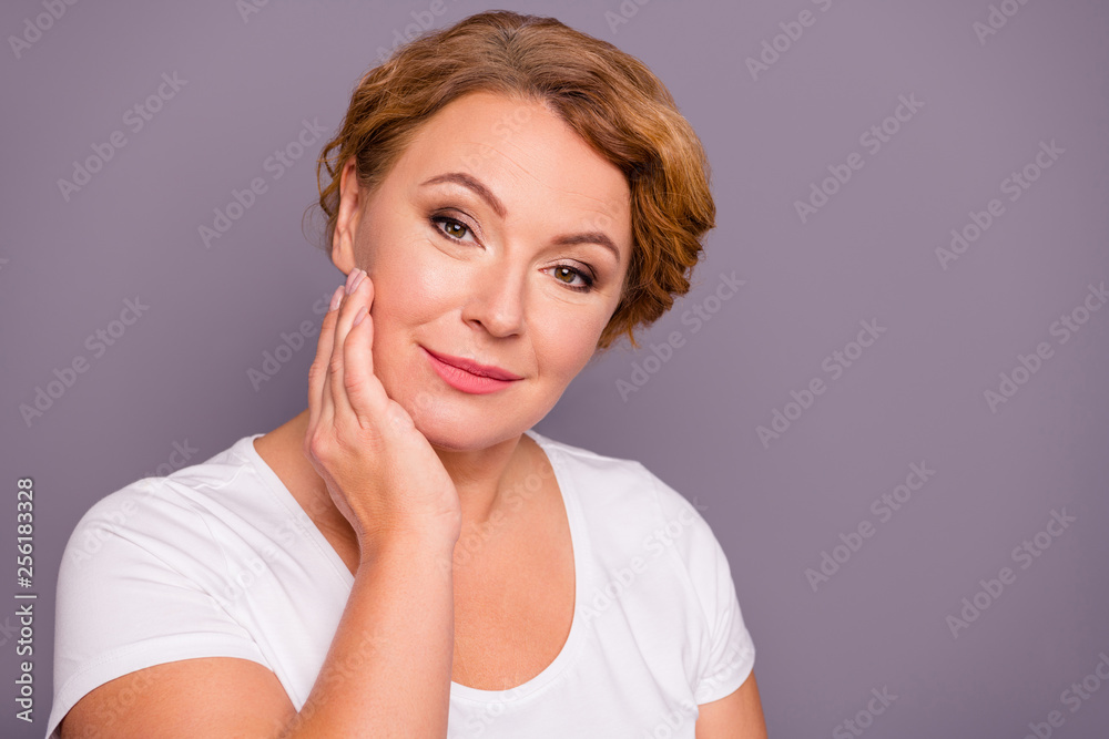 Close up photo beautiful amazing mature she her lady look self-confidently check facial skin after using new expensive wash lotion smearing cream wear white t-shirt isolated grey background Close up photo beautiful amazing mature she her lady look self-confidently check facial skin after using new expensive wash lotion smearing cream wear white t-shirt isolated grey background