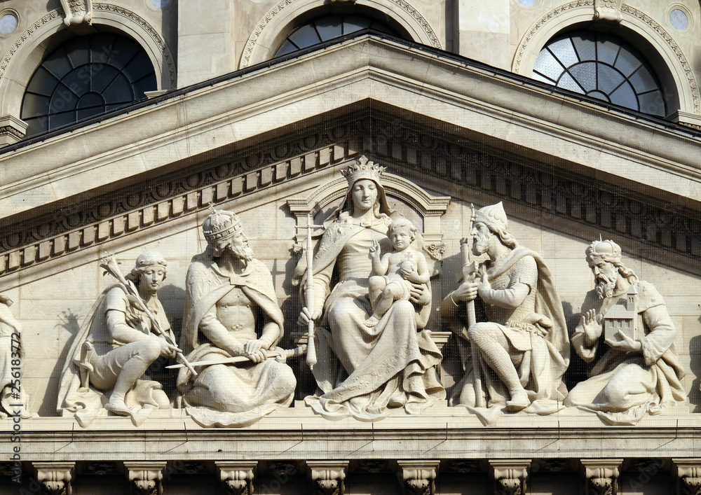 Obraz premium Tympanum bass relief showing the Virgin Mary and Hungarian saints, St. Stephen`s Basilica in Budapest, Hungary