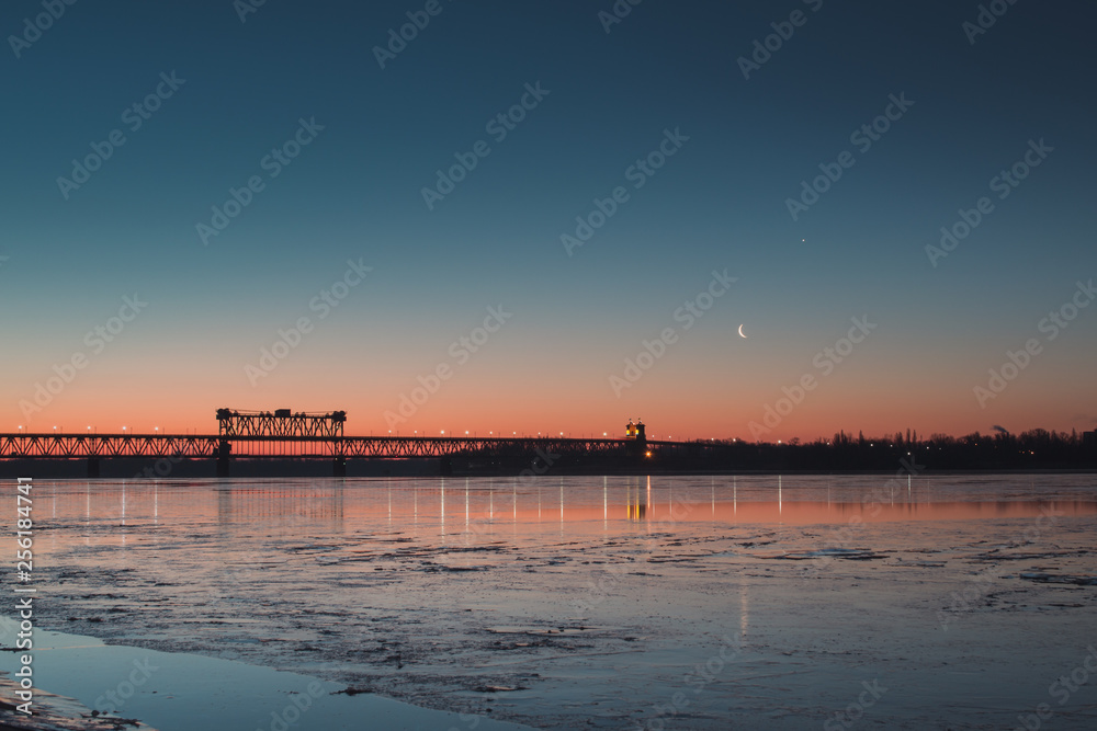 Early morning on the river coast. New moon. Early morning on the river coast. New moon.