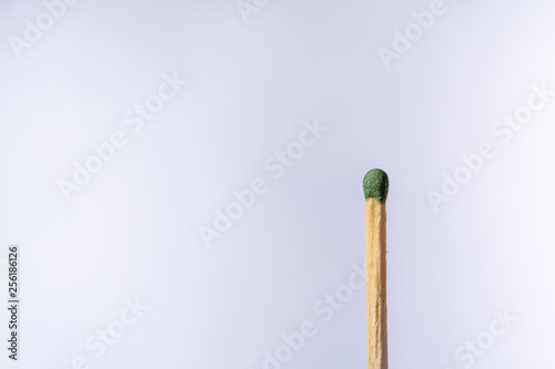 Wooden match tip isolated on white background.  © Станислав Гончарук