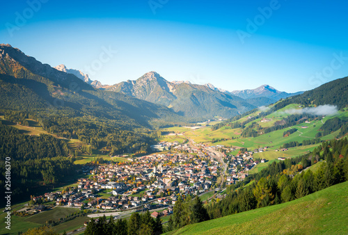 san candido, town in the middle of dolomites mountains. south tyrol, italy photo