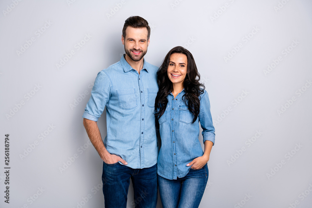 Close up portrait beautiful amazing cheer she her he him his couple lady guy friends stand close hands arms pockets wear casual jeans denim shirts outfit clothes isolated light grey background Close up portrait beautiful amazing cheer she her he him his couple lady guy friends stand close hands arms pockets wear casual jeans denim shirts outfit clothes isolated light grey background