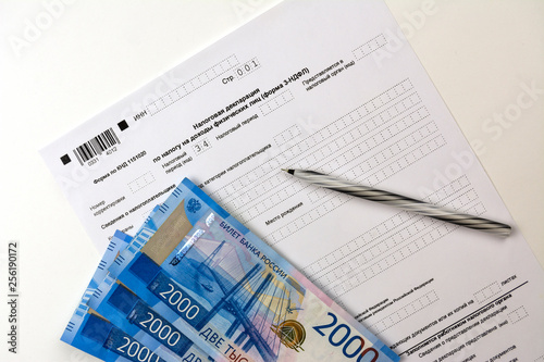 Russian documents, income Declaration Form 3-NDFL, cash 2000 rubles and a pen