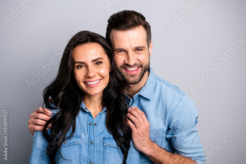 Happy family Close up photo of adorable affectionate cute family bonding warm comfort cozy cuddles sharing smiles happiness satisfaction memories in blue denim shirts isolated on silver background