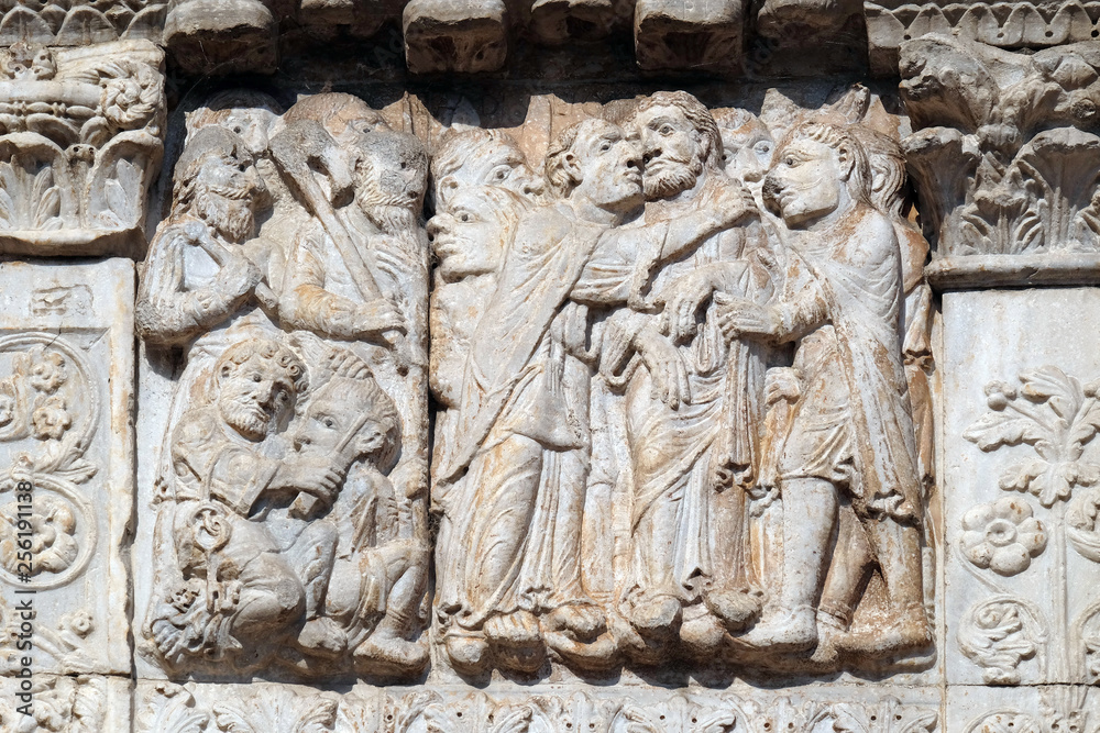 The Kiss of Judas, medieval relief on the facade of Basilica of San Zeno in Verona, Italy The Kiss of Judas, medieval relief on the facade of Basilica of San Zeno in Verona, Italy