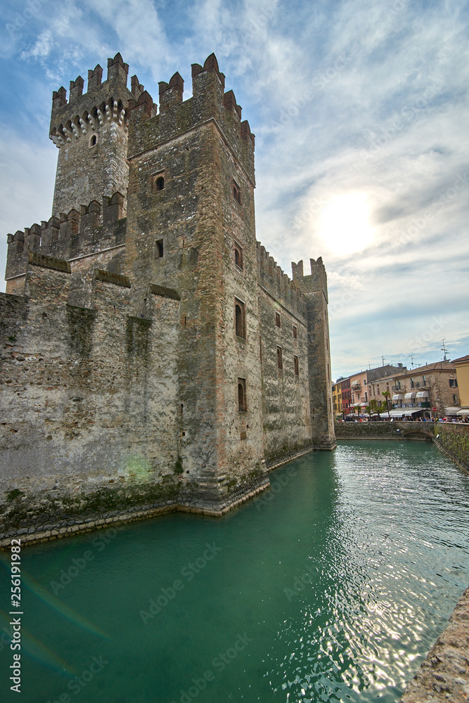 SIRMIONE, ITALY - 07 October 2018:Scaliger Castle in Sirmione,Lago di Garda in Italy,Old Castle in the Historical town Sirmione on peninsula in Garda lake, Lombardy