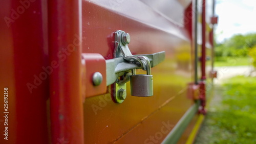 9713_A_silver_steel_padlock_on_the_red_truck.jpg