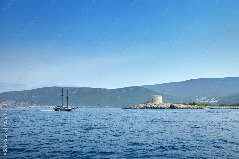 Mast yacht and Fort Arza, Adriatic sea coast, Montenegro