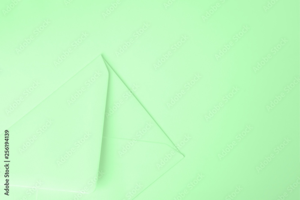 Green mint envelope on mint background. Minimal concept, copy space Green mint envelope on mint background. Minimal concept, copy space