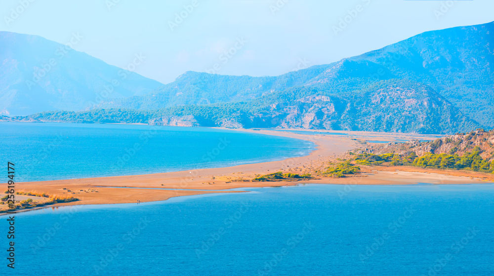 Panoramic view of iztuzu beach with full moon - Dalyan, Turkey Panoramic view of iztuzu beach with full moon - Dalyan, Turkey