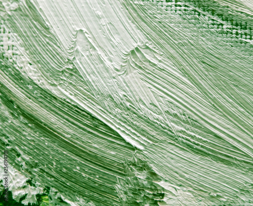 Green oil paint on canvas as abstract background
