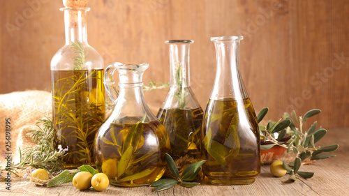 Fototapeta Naklejka Na Ścianę i Meble -  olive oil and branch, bottle composition