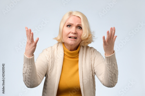 Angry old woman arguing with her husband